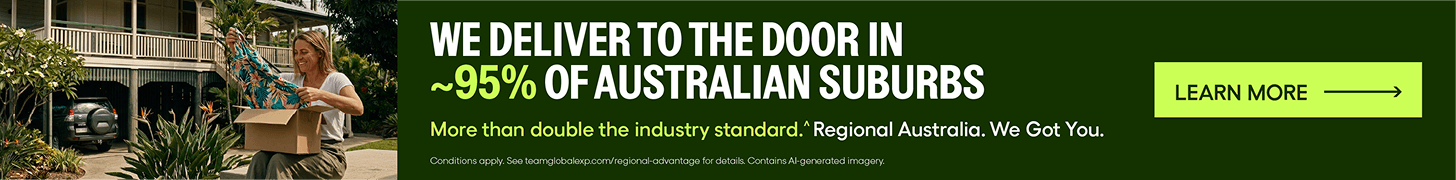 Woman sitting in regional Australia opening a delivered parcel